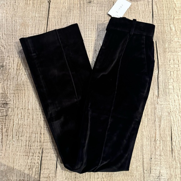 FRAME Slim Stacked Velvet Trousers in Black. - Picture 6 of 10